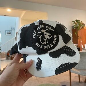 Cow print hat with vegan/animal rights patch